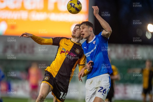 240126 - Newport County v Chesterfield - Sky Bet League 2 - James Crole of Newport County and Sil Swinkels of Chesterfield compete for the ball