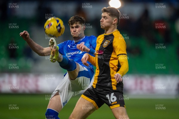 240126 - Newport County v Chesterfield - Sky Bet League 2 - James Crole of Newport County challenges Tom Pearce of Chesterfield