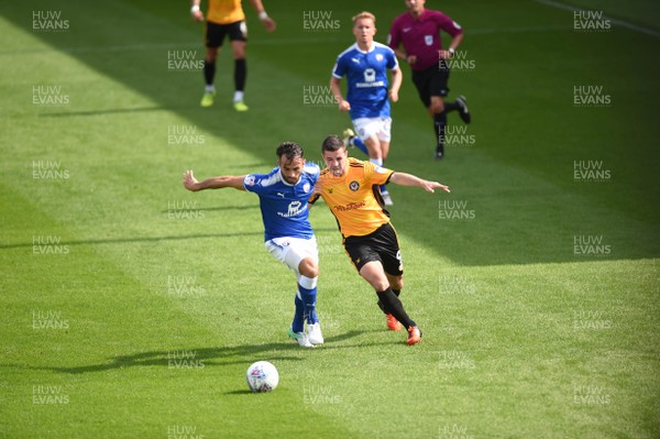 260817 - Newport County v Chesterfield - SkyBet League 2 - Sam Hird of Chesterfield and Padraig Amond of Newport Conty compete