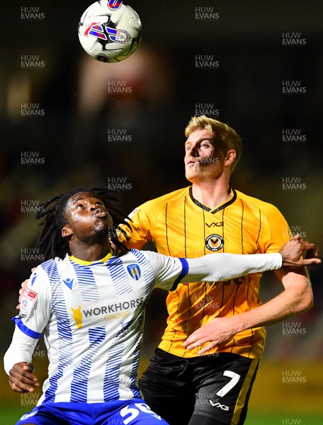 031023 - Newport County v Colchester United - EFL SkyBet League 2 - Al-Amin Kazeem of Colchester United and Will Evans of Newport County compete