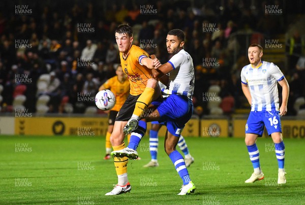 031023 - Newport County v Colchester United - EFL SkyBet League 2 - Ryan Delaney of Newport County and Will Greenidge of Colchester United