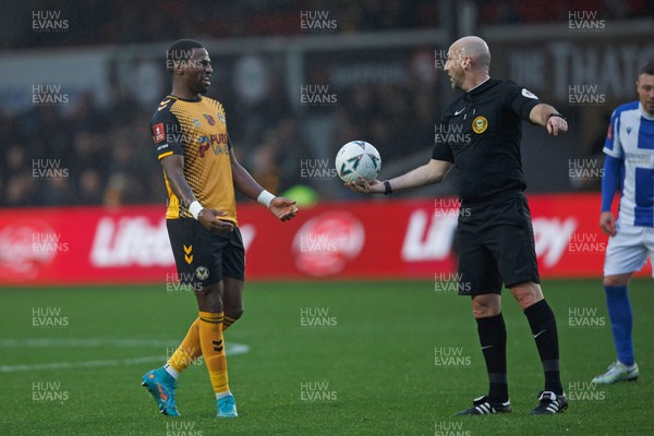 051122 - Newport County v Colchester United - FA Cup First Round - Omar Bogle of Newport County talks to Referee Robert Madden