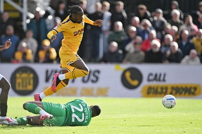 101026 - Newport County v Colchester United - Sky Bet League 2 - Yahya Bamba of Newport County is challenged by Thimothee Lo-Tutala of Colchester