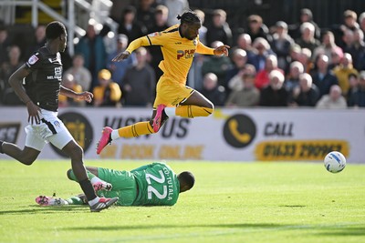 101026 - Newport County v Colchester United - Sky Bet League 2 - Yahya Bamba of Newport County is challenged by Thimothee Lo-Tutala of Colchester
