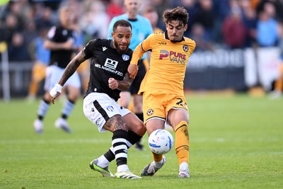 101026 - Newport County v Colchester United - Sky Bet League 2 - Matt Dibley-Dias of Newport County is challenged by Jay Williams of Colchester