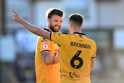 101026 - Newport County v Colchester United - Sky Bet League 2 - Kyle Cameron of Newport County and Ciaran Brennan of Newport County at full time