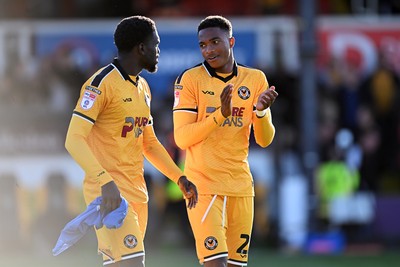 101026 - Newport County v Colchester United - Sky Bet League 2 - Michael Adu-Poku of Newport County and Tanatswa Nyakuhwa of Newport County at full time