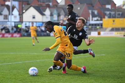 101026 - Newport County v Colchester United - Sky Bet League 2 - Yahya Bamba of Newport County is challenged by Harry Anderson of Colchester