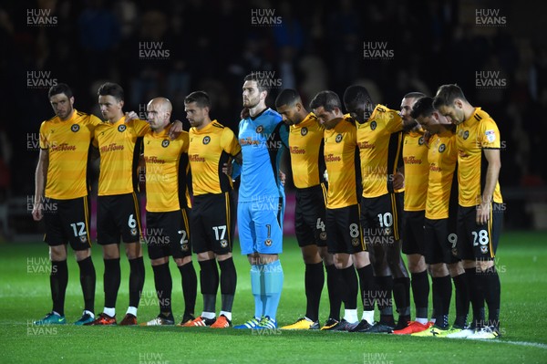 171017 - Newport County v Colchester United - SkyBet League 2 - Newport County players during a moment silence before kick off