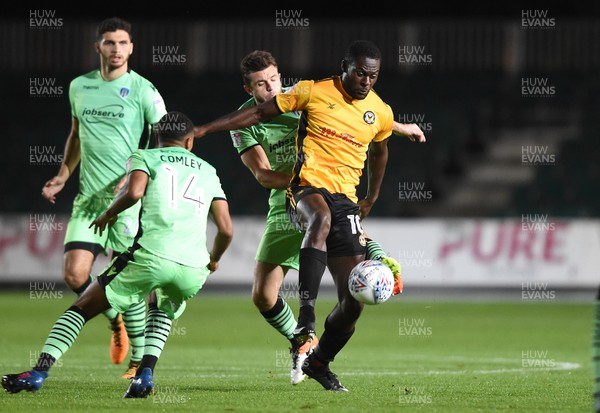 171017 - Newport County v Colchester United - SkyBet League 2 - Frank Nouble of Newport County is tackled by Doug Loft of Colchester United