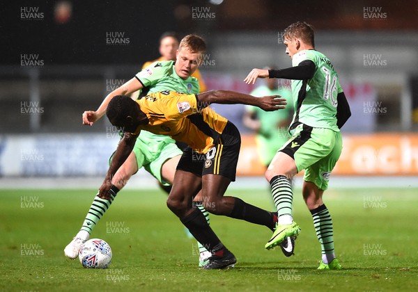 171017 - Newport County v Colchester United - SkyBet League 2 - Frank Nouble of Newport County is tackled by Frankie Kent and Sean Murray of Colchester United