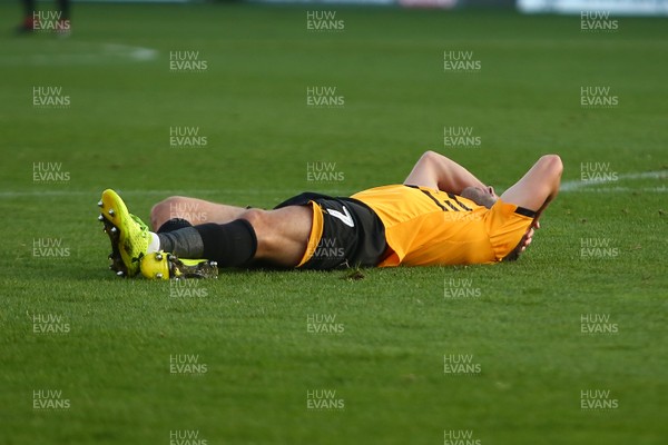 171118 Newport County v Colchester United - Sky Bet League 2 - Robbie Willmott of Newport County lays injured before leaving the field