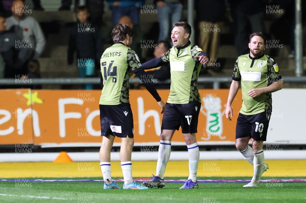 220422 - Newport County v Colchester United, Sky Bet League 2 - Noah Chilvers of Colchester United celebrates with team mates after scoring the second goal