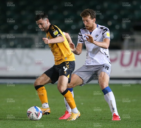 271020 - Newport County v Colchester United - SkyBet League Two - Padraig Amond of Newport County is challenged by Tom Eastman Colchester United