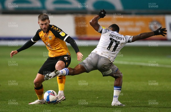 271020 - Newport County v Colchester United - SkyBet League Two - Brandon Cooper of Newport County is tackled by Callum Harriott Colchester United