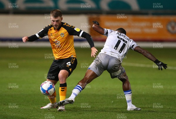 271020 - Newport County v Colchester United - SkyBet League Two - Brandon Cooper of Newport County is tackled by Callum Harriott Colchester United