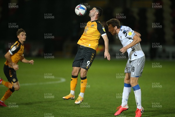 271020 - Newport County v Colchester United - SkyBet League Two - Padraig Amond of Newport County is challenged by Tom Eastman Colchester United