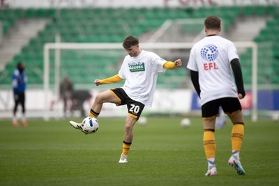 070326 - Newport County v Colchester United - Sky Bet League 2 - Ben Lloyd of Newport County warms up 