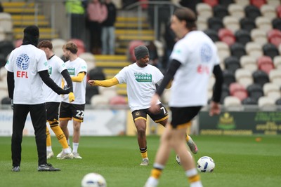 070326 - Newport County v Colchester United - Sky Bet League 2 - Bobby Kamwa of Newport County in the warm up 