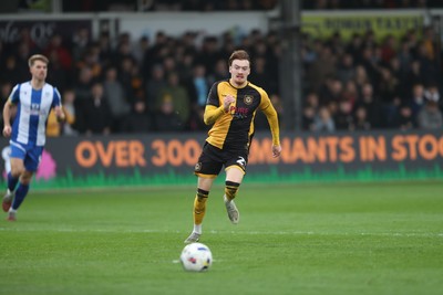 070326 - Newport County v Colchester United - Sky Bet League 2 - Michael Spellman of Newport County chases a Colchester back pass
