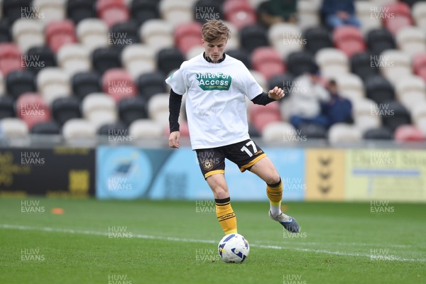 070326 - Newport County v Colchester United - Sky Bet League 2 - Tom Davies of Newport County warms up