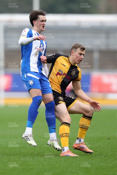 070326 - Newport County v Colchester United - Sky Bet League 2 - Finley Barbrook of Colchester United and Sven Sprangler of Newport County