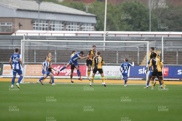 070326 - Newport County v Colchester United - Sky Bet League 2 - Newport clear from a Colchester corner