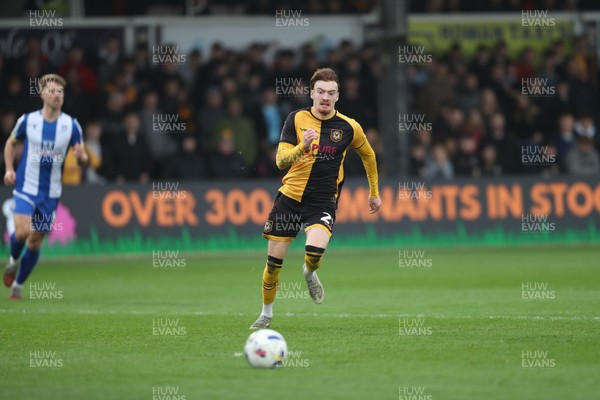 070326 - Newport County v Colchester United - Sky Bet League 2 - Michael Spellman of Newport County chases a Colchester back pass