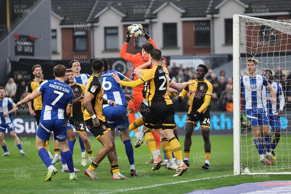 070326 - Newport County v Colchester United - Sky Bet League 2 - Matt Macey of Colchester United claims the ball 