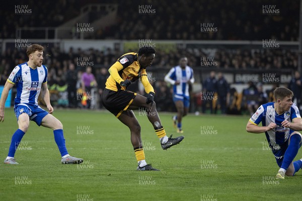 070326 - Newport County v Colchester United - Sky Bet League 2 - Nathan Opoku of Newport County shoots 