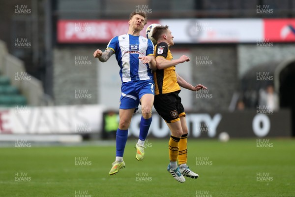 070326 - Newport County v Colchester United - Sky Bet League 2 - Harry Anderson of Colchester United and Matt Smith of Newport County 