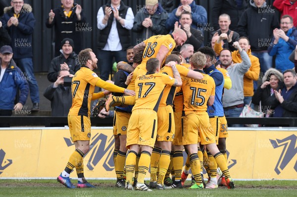 010417 - Newport County v Crawley Town, Sky Bet League 2 - Newport County players celebrate with Mickey Demetriou after he scores goal