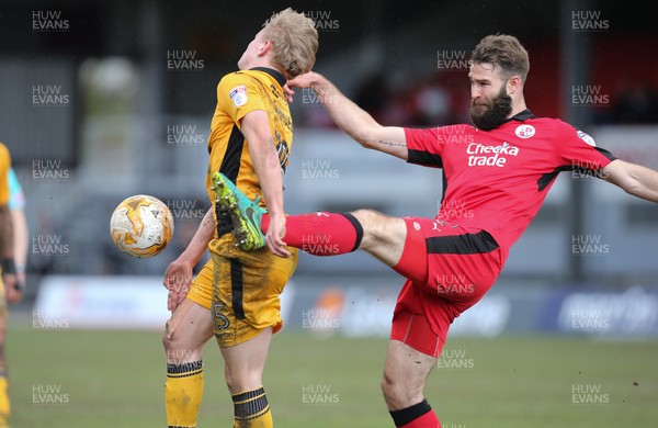 010417 - Newport County v Crawley Town, Sky Bet League 2 - Alex Samuel of Newport County is caught by Joe McNerney of Crawley Town as he goes for the ball