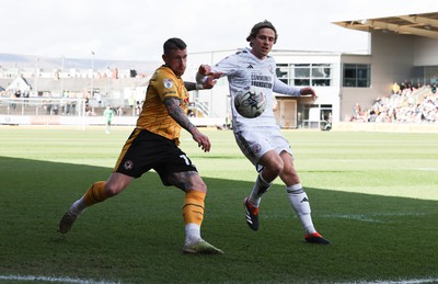 010424 - Newport County v Crawley Town, EFL Sky Bet League 2 - Scot Bennett of Newport County and Danilo Orsi of Crawley Town compete for the ball