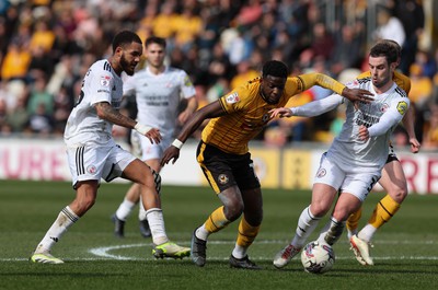 010424 - Newport County v Crawley Town, EFL Sky Bet League 2 - Offrande Zanzala of Newport County takes on Dion Conroy of Crawley Town