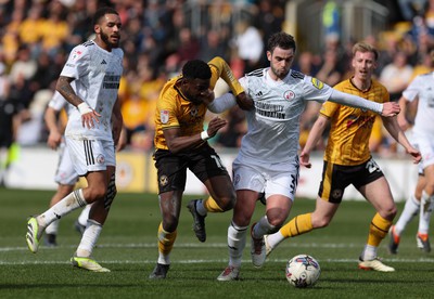 010424 - Newport County v Crawley Town, EFL Sky Bet League 2 - Offrande Zanzala of Newport County takes on Dion Conroy of Crawley Town