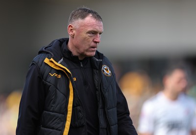 010424 - Newport County v Crawley Town, EFL Sky Bet League 2 - Newport County manager Graham Coughlan walks back to the changing room at half time