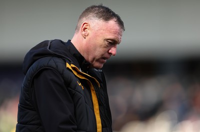 010424 - Newport County v Crawley Town, EFL Sky Bet League 2 - Newport County manager Graham Coughlan walks back to the changing room at half time