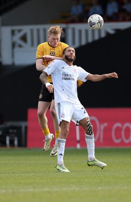 010424 - Newport County v Crawley Town, EFL Sky Bet League 2 - Will Evans of Newport County and Jay Williams of Crawley Town compete for the ball