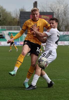 010424 - Newport County v Crawley Town, EFL Sky Bet League 2 - Harrison Bright of Newport County and Nicholas Tsaroulla of Crawley Town compete for the ball