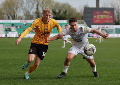 010424 - Newport County v Crawley Town, EFL Sky Bet League 2 - Harrison Bright of Newport County and Nicholas Tsaroulla of Crawley Town compete for the ball