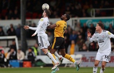 010424 - Newport County v Crawley Town, EFL Sky Bet League 2 - Dion Conroy of Crawley Town and Omar Bogle of Newport County compete for the ball