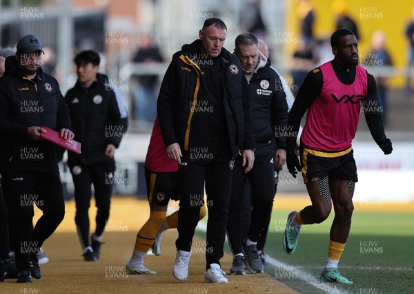 010424 - Newport County v Crawley Town, EFL Sky Bet League 2 - Newport County manager Graham Coughlan walks back to the changing room at half time