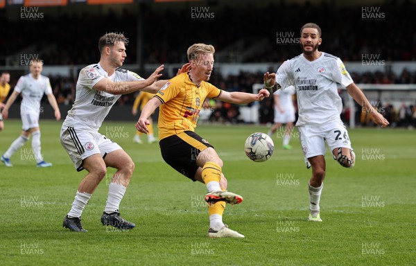 010424 - Newport County v Crawley Town, EFL Sky Bet League 2 - Harry Charsley of Newport County plays the ball in under pressure