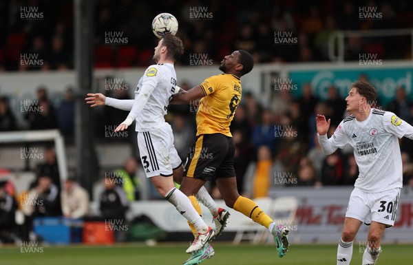 010424 - Newport County v Crawley Town, EFL Sky Bet League 2 - Dion Conroy of Crawley Town and Omar Bogle of Newport County compete for the ball
