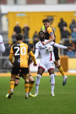 030426 - Newport County v Crawley Town - Sky Bet League 2 - Matthew Baker of Newport County is challenged by Dion Conroy of Crawley