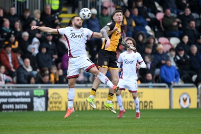 030426 - Newport County v Crawley Town - Sky Bet League 2 - James Crole of Newport County is challenged by Charlie Barker of Crawley