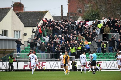 030426 - Newport County v Crawley Town - Sky Bet League 2 - Crawley fans celebrate after their side score a second goal