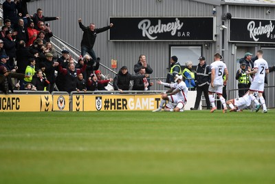 030426 - Newport County v Crawley Town - Sky Bet League 2 - Crawley fans celebrate after their side score a second goal