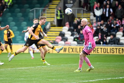 030426 - Newport County v Crawley Town - Sky Bet League 2 - Cameron Evans of Newport County heads close